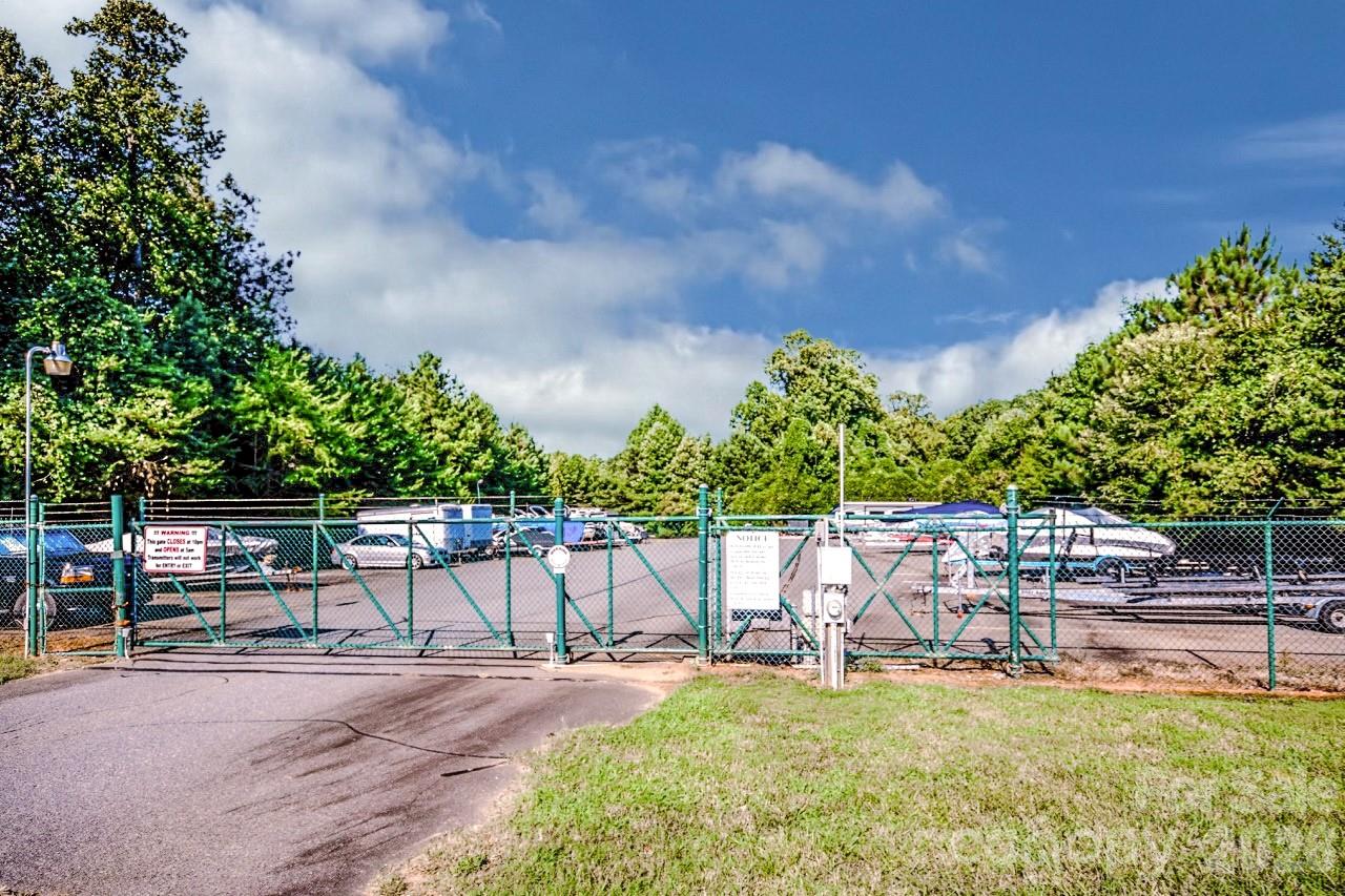 150 Coronilla Road Mooresville, NC 28117 - Photo 37 of 39 a view of a yard with table and chairs