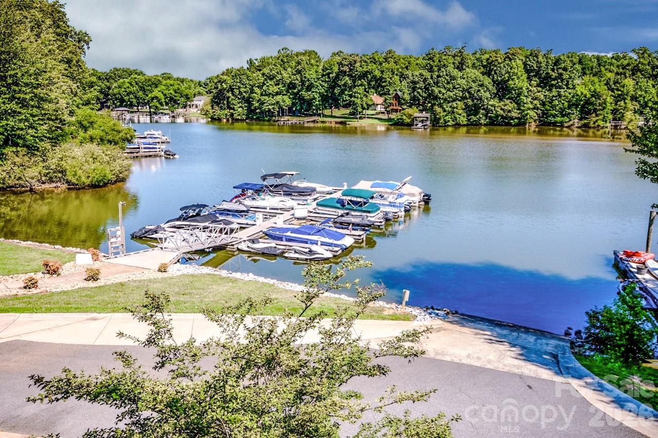 150 Coronilla Road Mooresville, NC 28117 - Photo 39 of 39 a view of a lake with a city