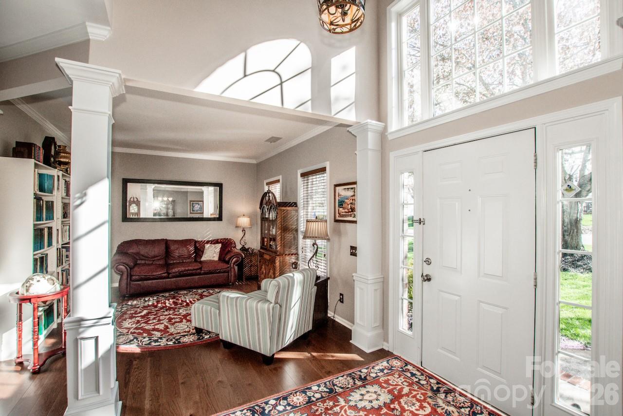 150 Coronilla Road Mooresville, NC 28117 - Photo 5 of 39 a living room with furniture and a window