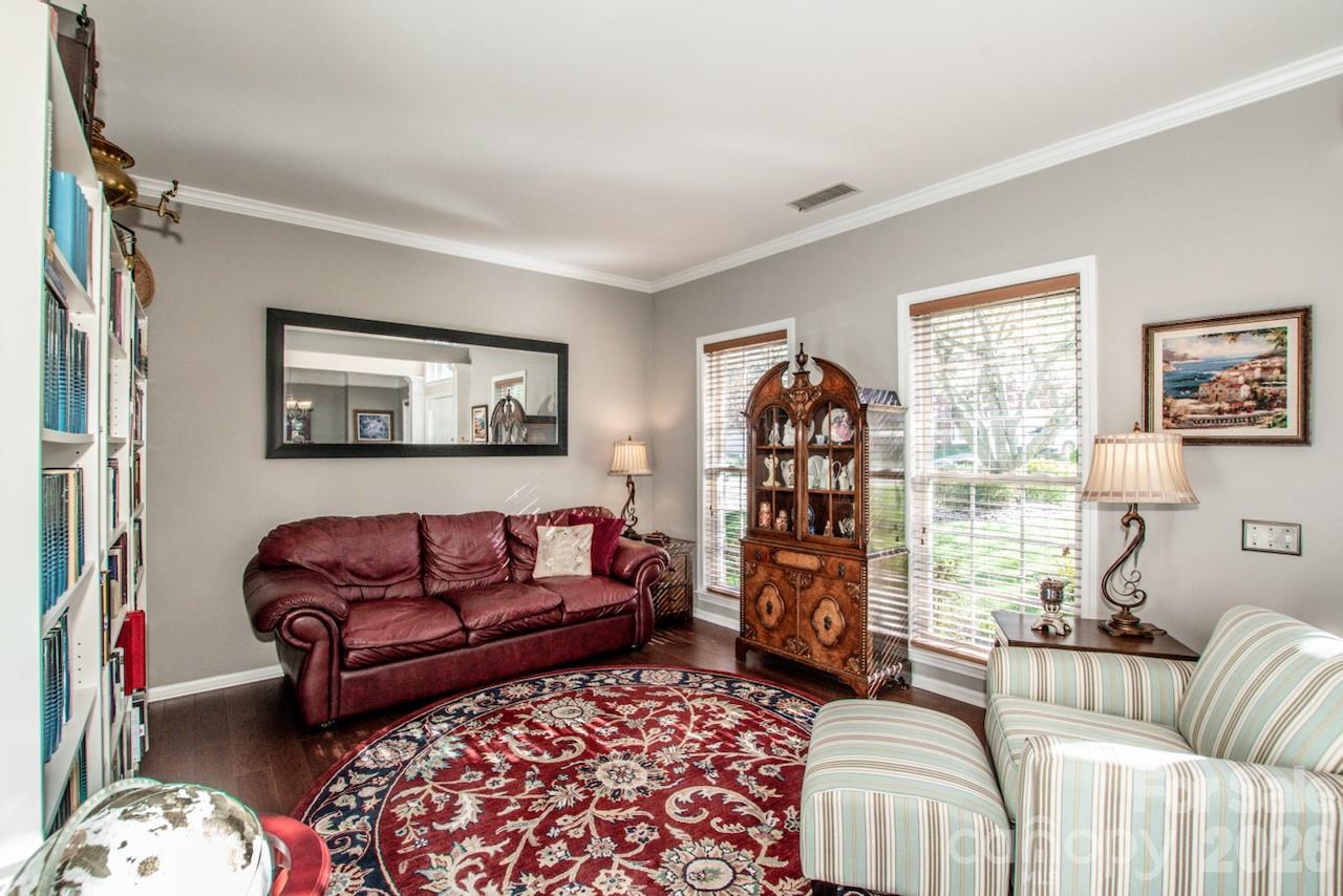 150 Coronilla Road Mooresville, NC 28117 - Photo 6 of 39 a living room with furniture and a window