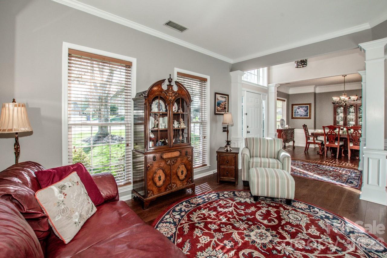 150 Coronilla Road Mooresville, NC 28117 - Photo 7 of 39 a living room with furniture and a window