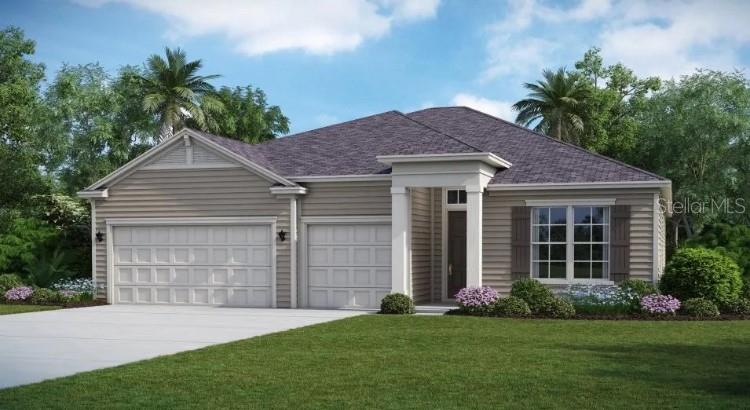 19446 Southwest 79th Street Dunnellon, FL 34432 - Photo 1 of 1 a front view of a house with a garden