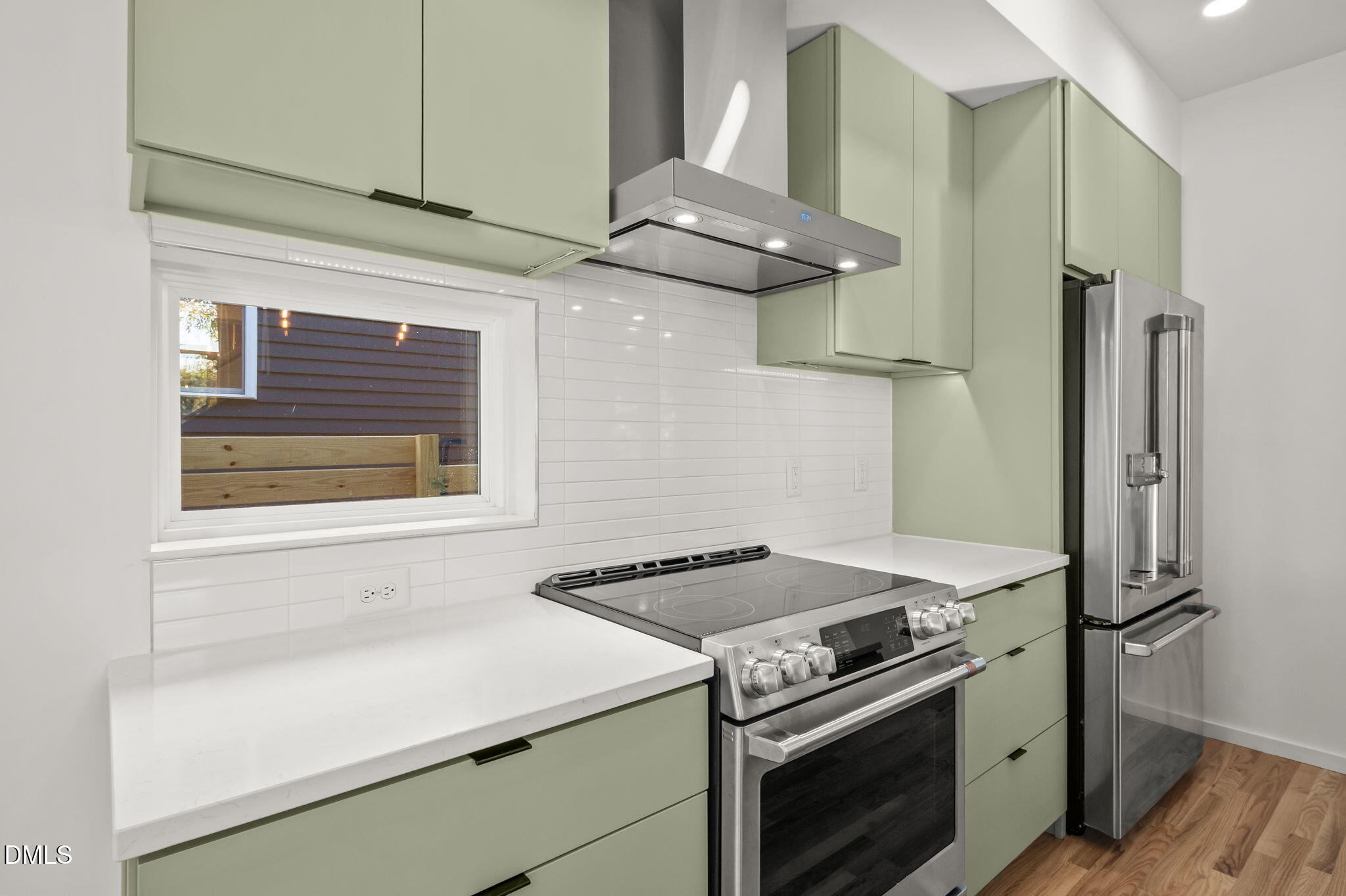 1605 Glendale Avenue Durham, NC 27701 - Photo 10 of 41 a kitchen with a stove and a refrigerator