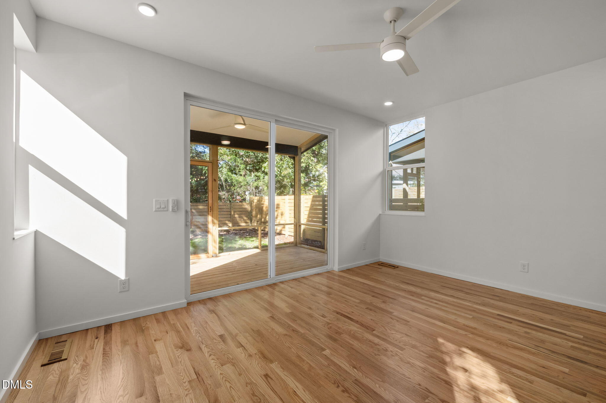 1605 Glendale Avenue Durham, NC 27701 - Photo 13 of 41 wooden floor in an empty room with a window