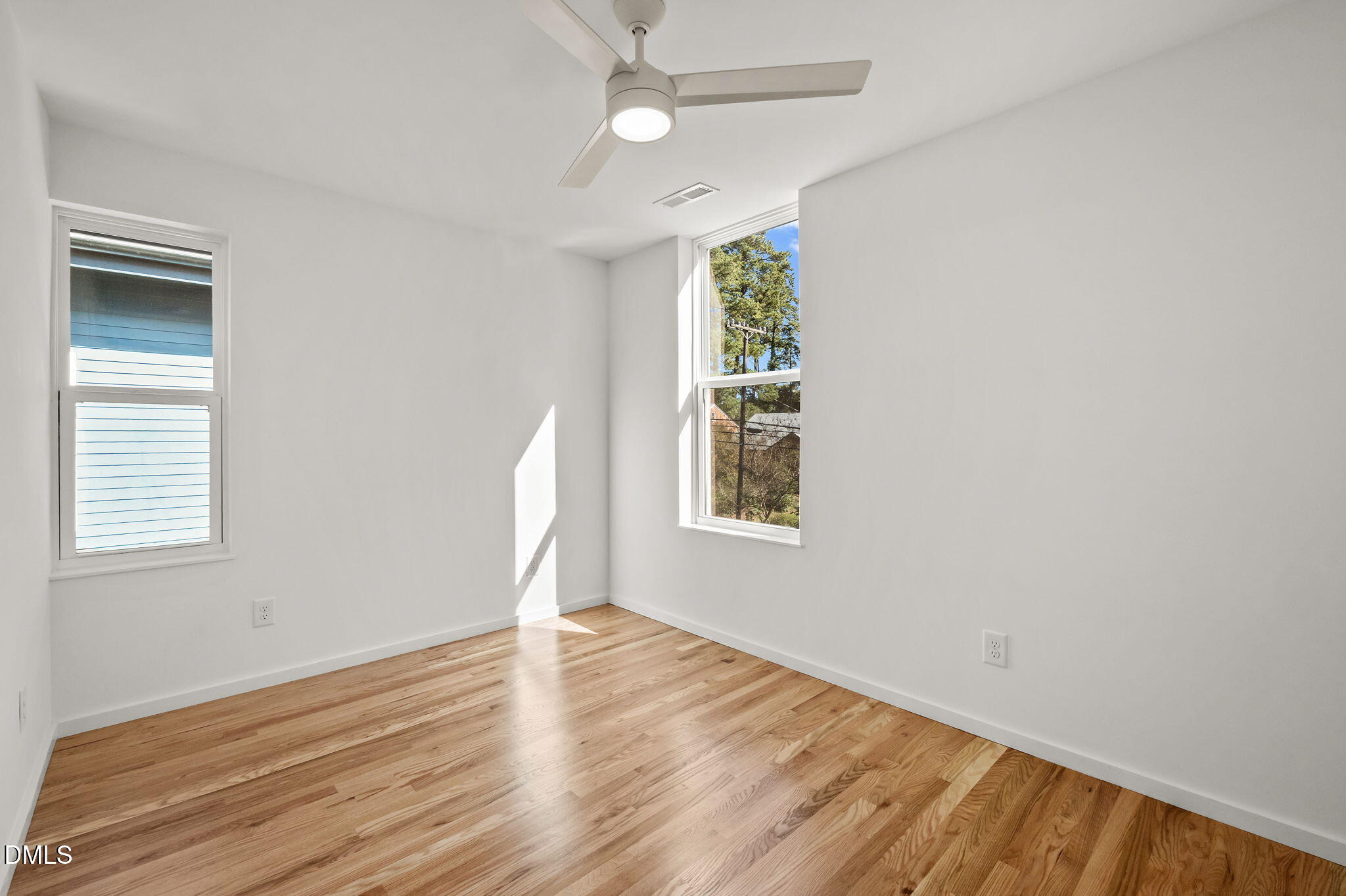 1605 Glendale Avenue Durham, NC 27701 - Photo 24 of 41 wooden floor in an empty room with a window