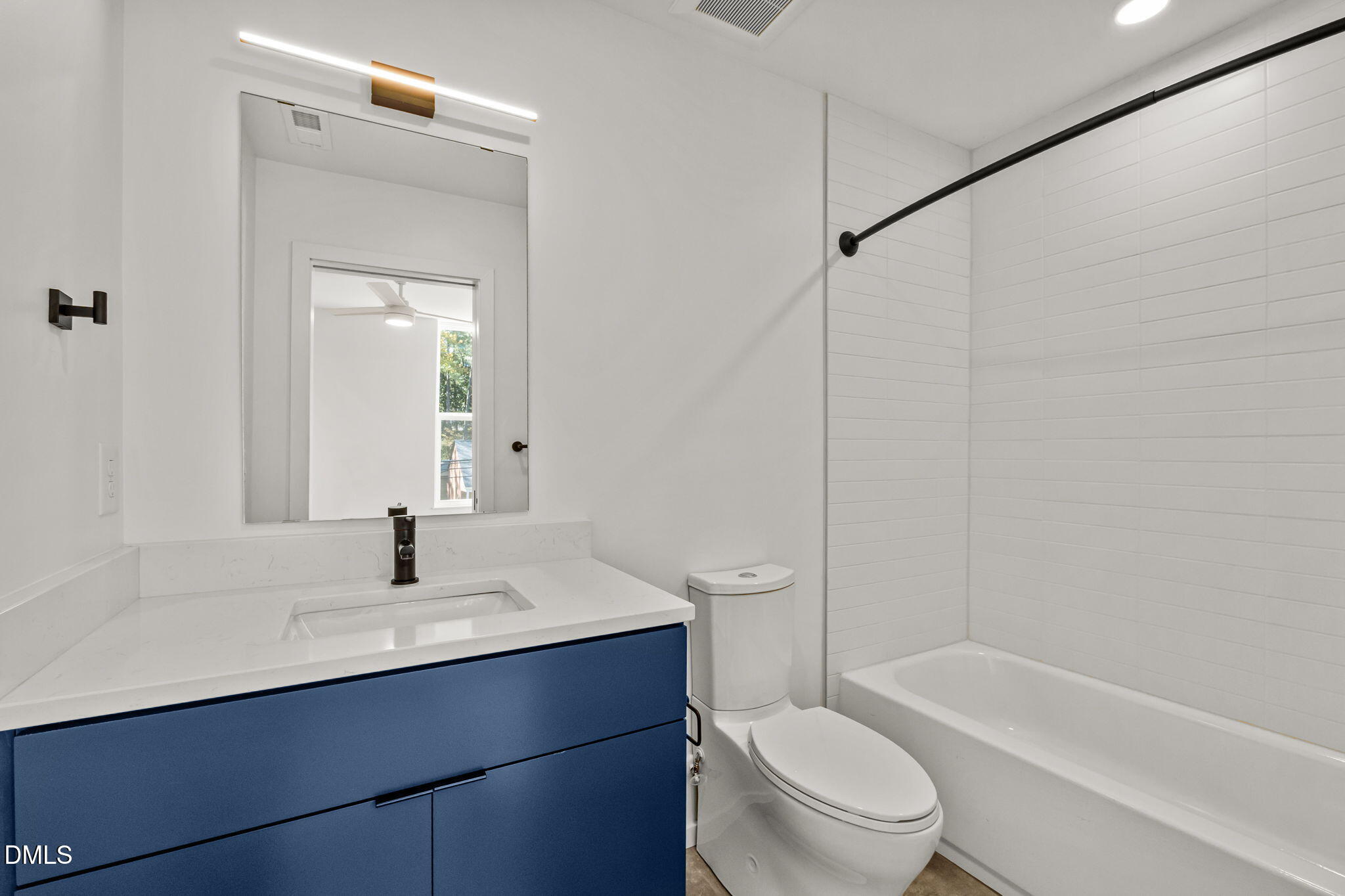 1605 Glendale Avenue Durham, NC 27701 - Photo 26 of 41 a bathroom with a sink toilet and shower