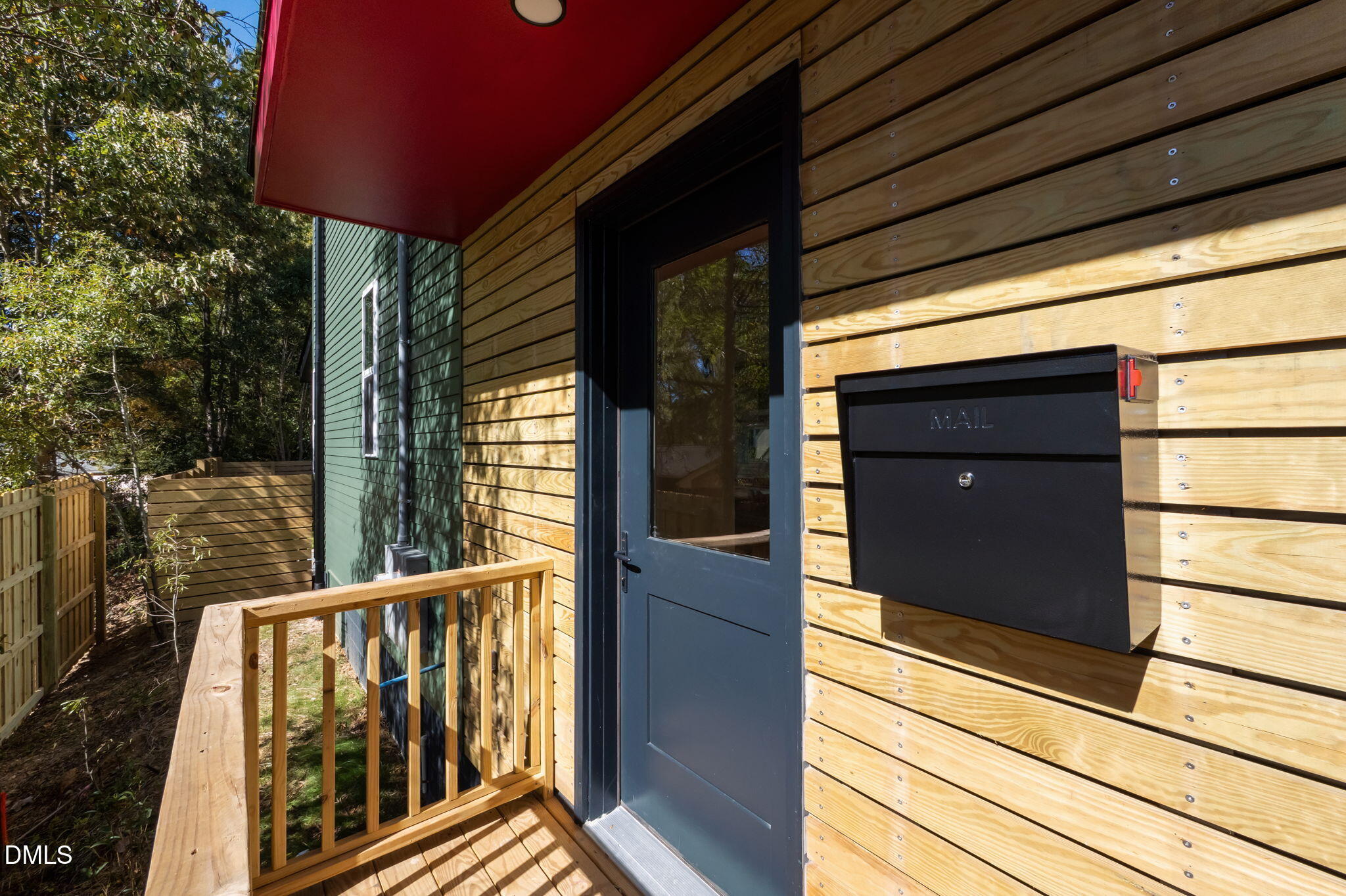 1605 Glendale Avenue Durham, NC 27701 - Photo 4 of 41 a view of a balcony with a potted plant
