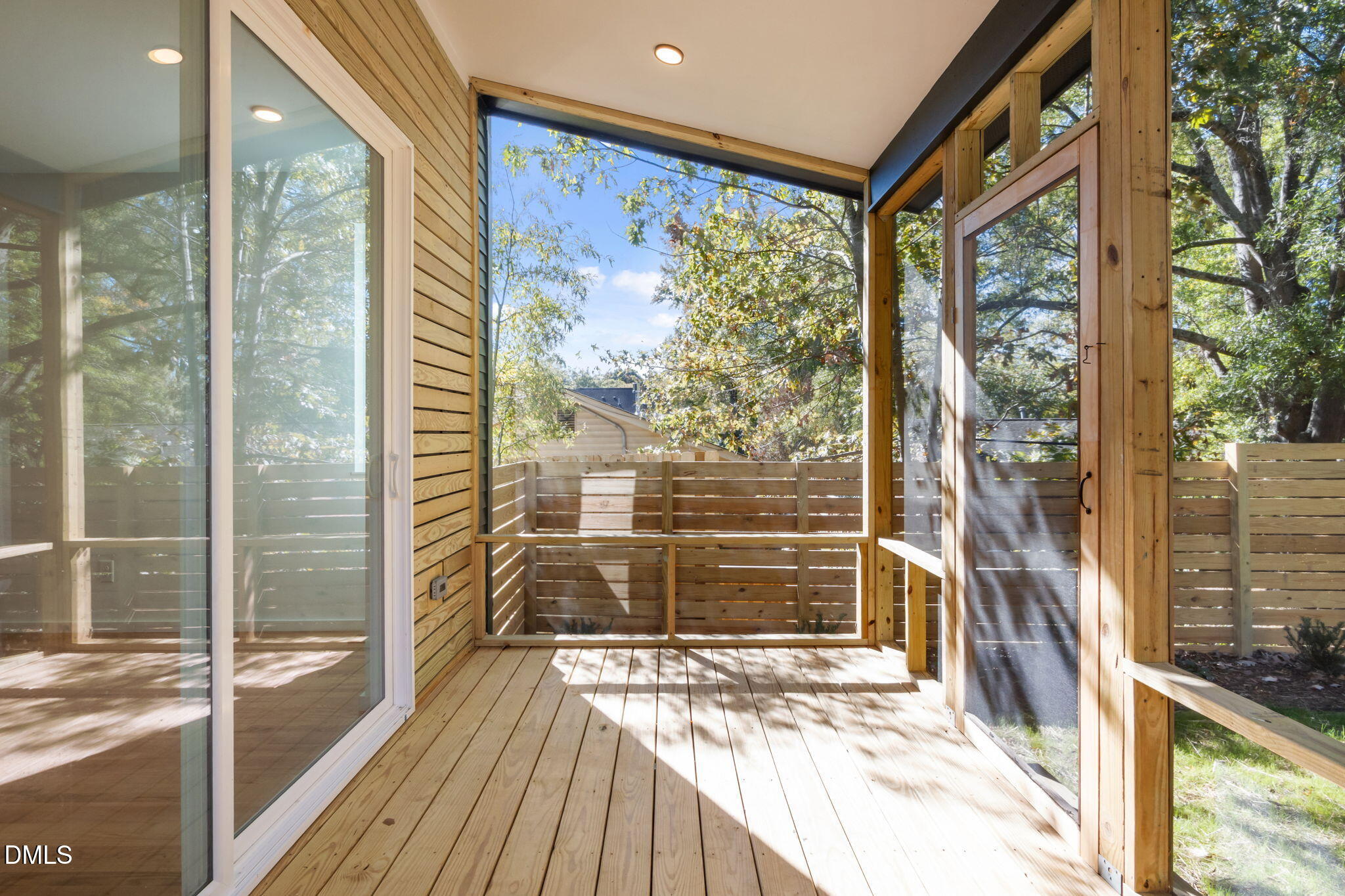 1605 Glendale Avenue Durham, NC 27701 - Photo 7 of 41 a view of a room with wooden floor and a floor to ceiling window