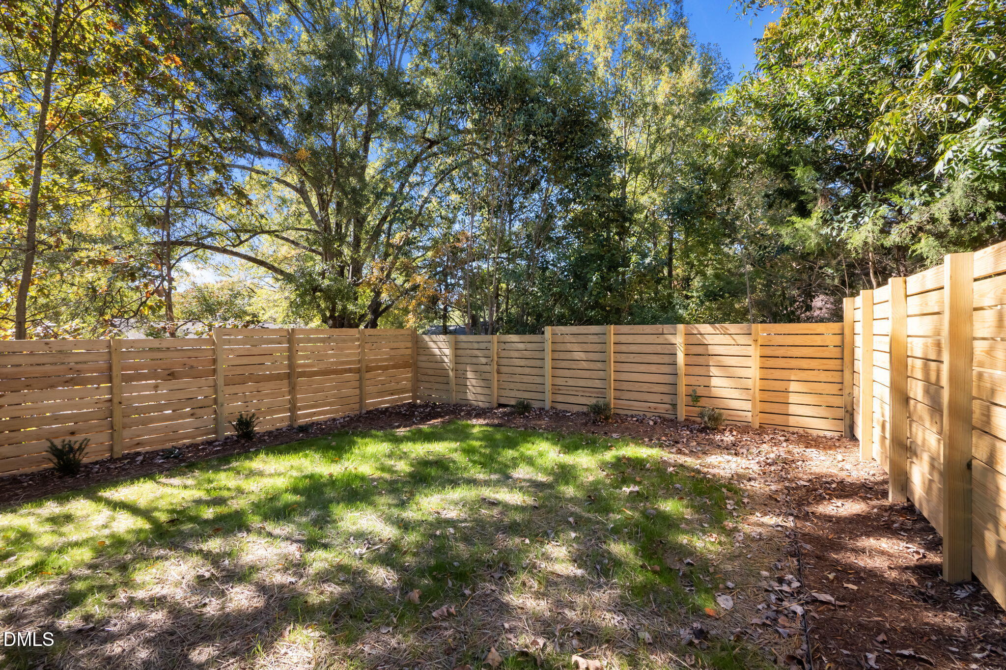 1605 Glendale Avenue Durham, NC 27701 - Photo 9 of 41 a view of a yard with wooden fence