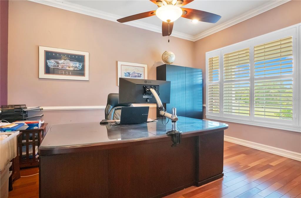 5785 Gilliam Road Orlando, FL 32818 - Photo 18 of 100 a dining room with furniture and wooden floor