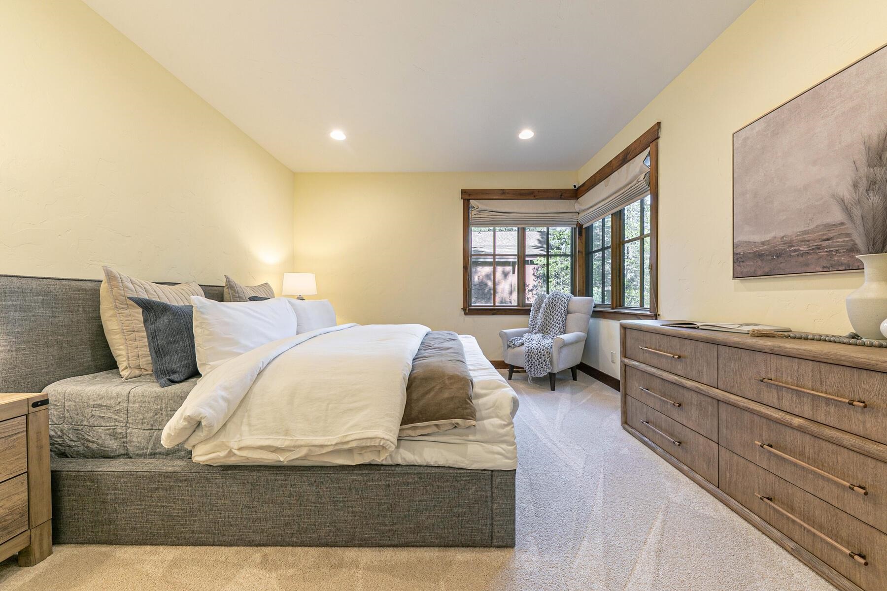 11541 Bottcher Loop Truckee, CA 96161 - Photo 19 of 28 a bedroom with a large bed and a window