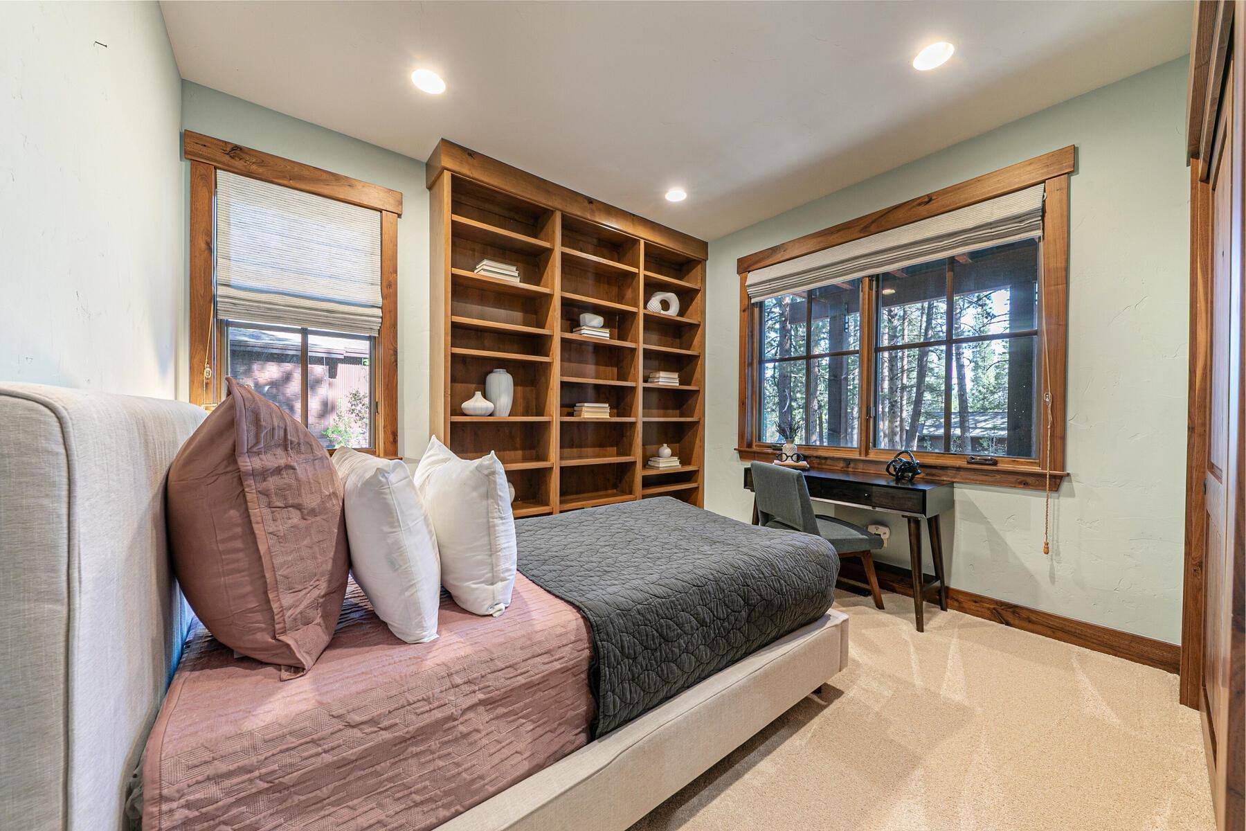 11541 Bottcher Loop Truckee, CA 96161 - Photo 21 of 28 a spacious bedroom with a large bed and a window