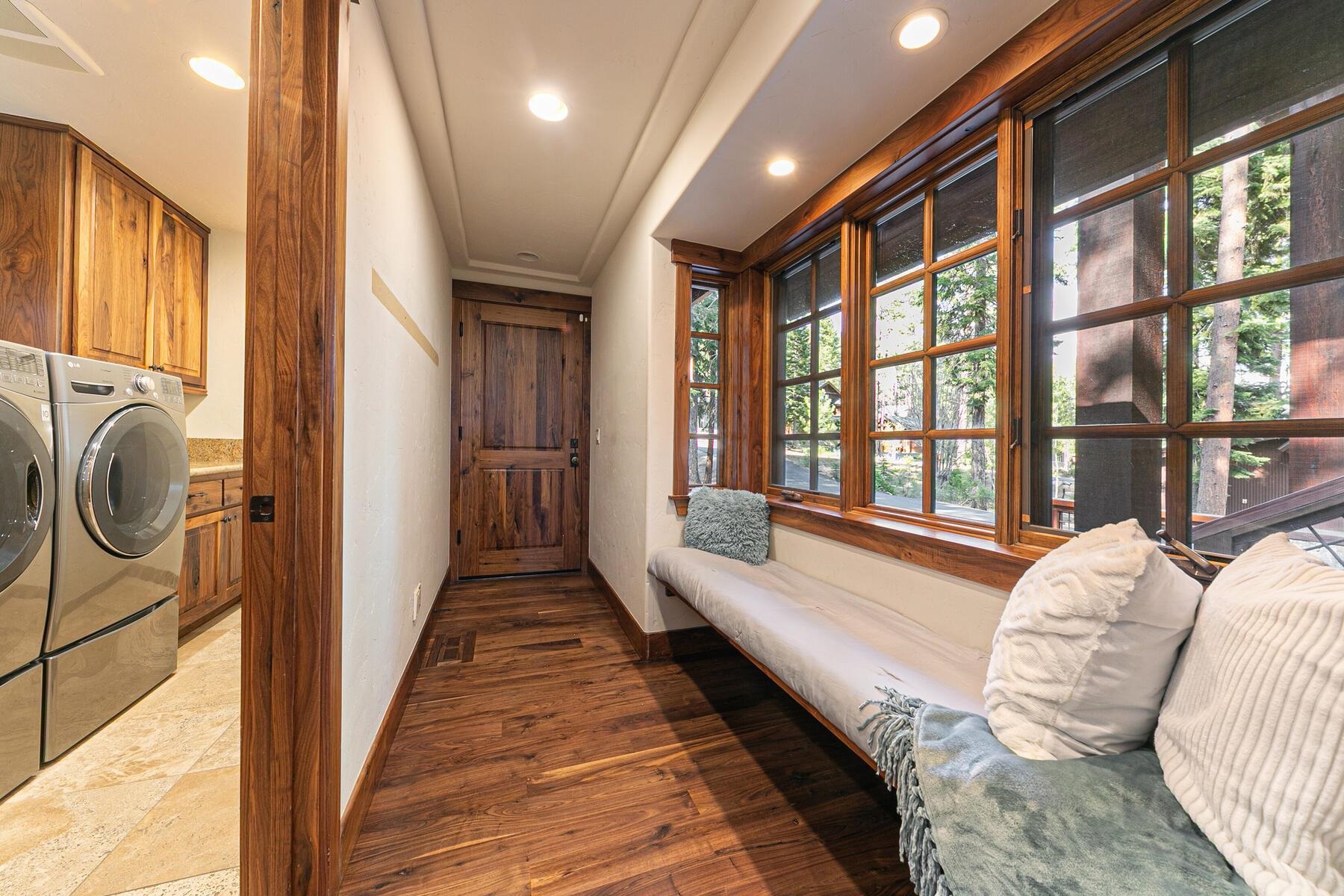 11541 Bottcher Loop Truckee, CA 96161 - Photo 22 of 28 a spacious bedroom with a bed and large windows