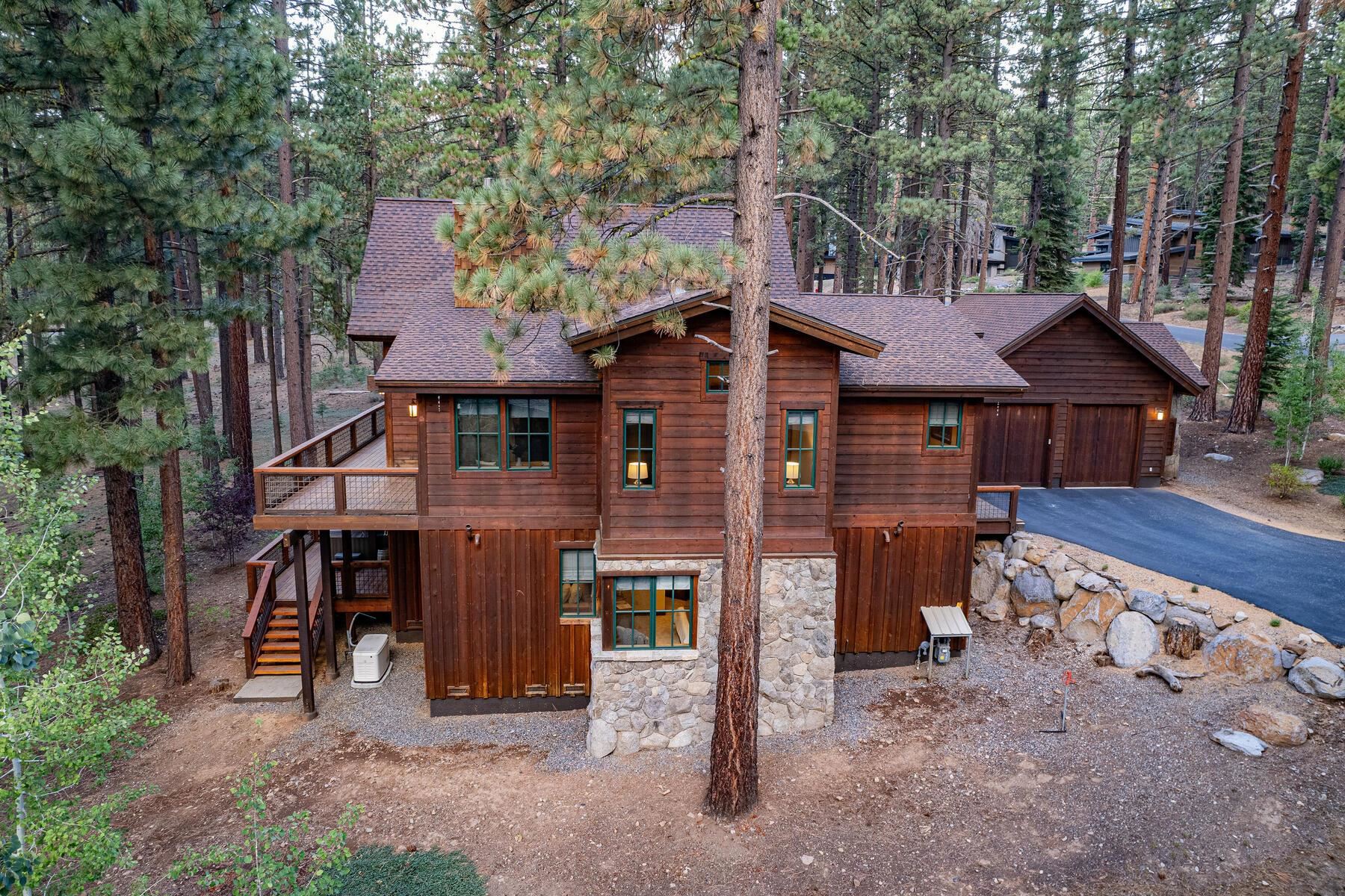 11541 Bottcher Loop Truckee, CA 96161 - Photo 25 of 28 a front view of a house with a yard and garage