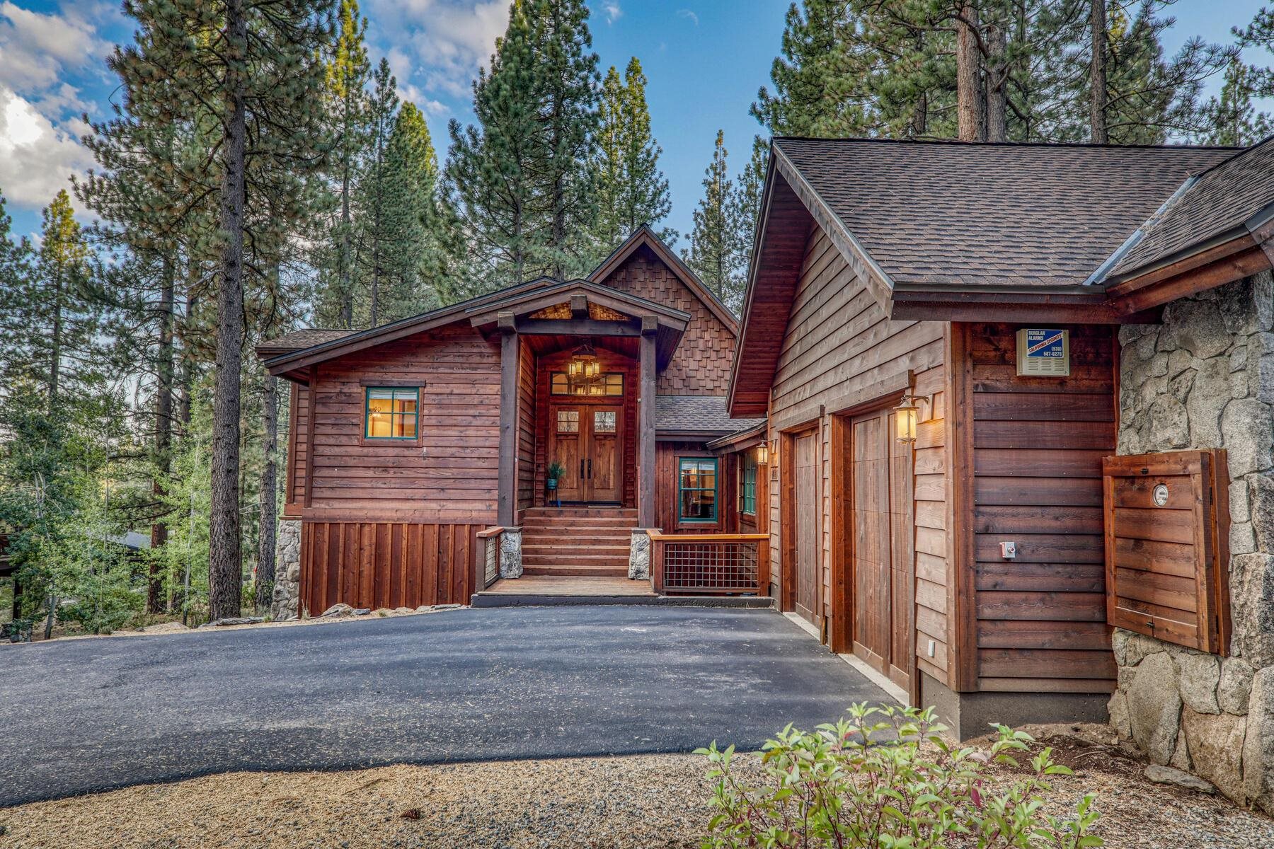 11541 Bottcher Loop Truckee, CA 96161 - Photo 3 of 28 a front view of a house with a garden