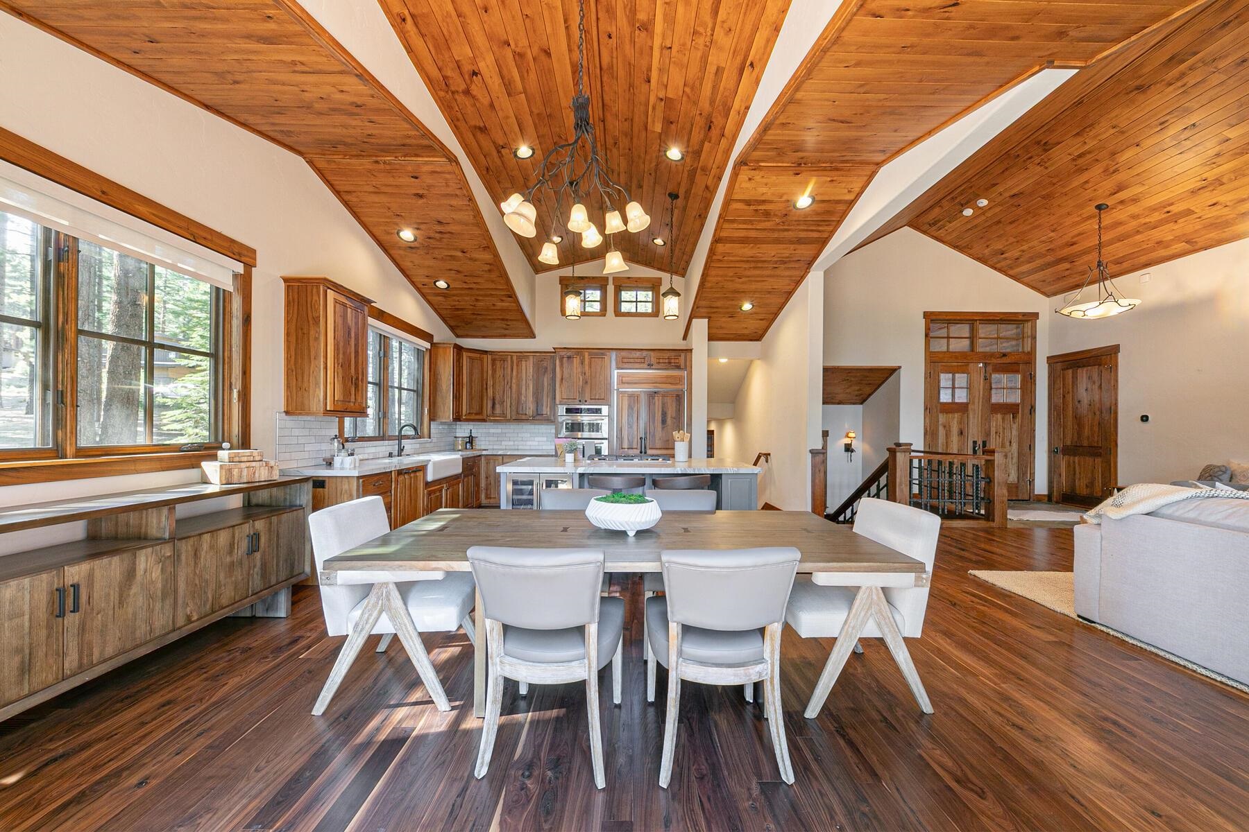 11541 Bottcher Loop Truckee, CA 96161 - Photo 8 of 28 a view of a dining room with furniture window and wooden floor