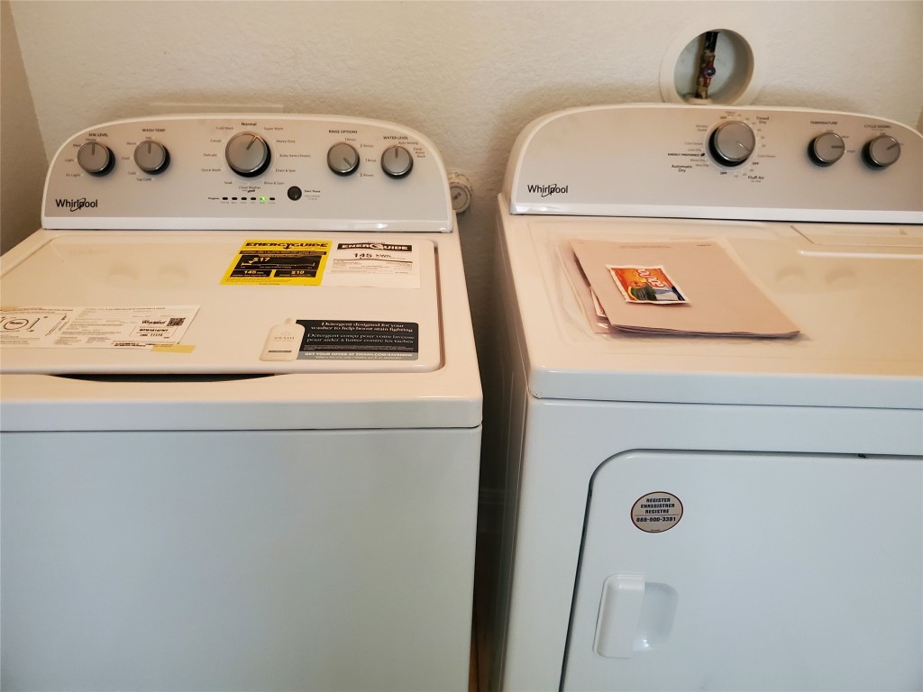 6708 Menchaca Road, Unit 7 Austin, TX 78745 - Photo 17 of 32 a utility room with dryer and washer