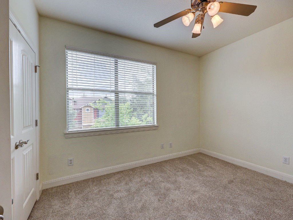6708 Menchaca Road, Unit 7 Austin, TX 78745 - Photo 19 of 32 an empty room with a window