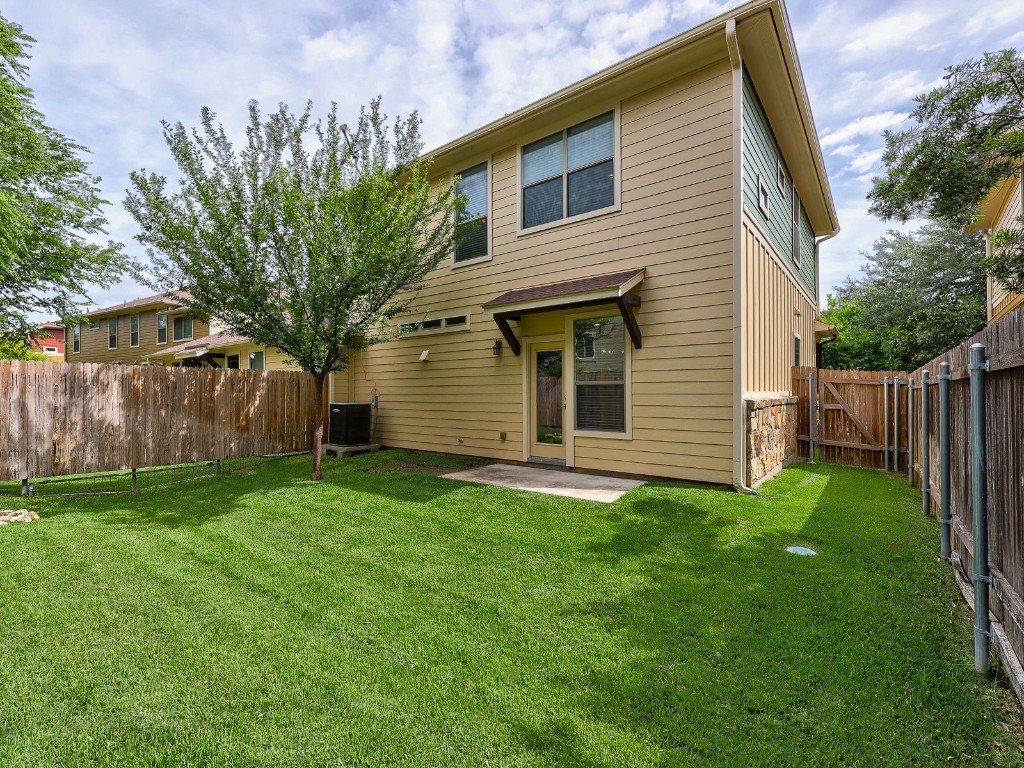 6708 Menchaca Road, Unit 7 Austin, TX 78745 - Photo 26 of 32 a view of a house with backyard
