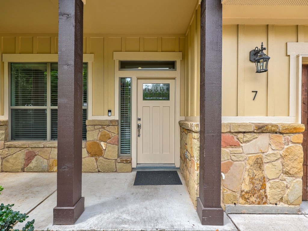 6708 Menchaca Road, Unit 7 Austin, TX 78745 - Photo 3 of 32 a view of front door of a house