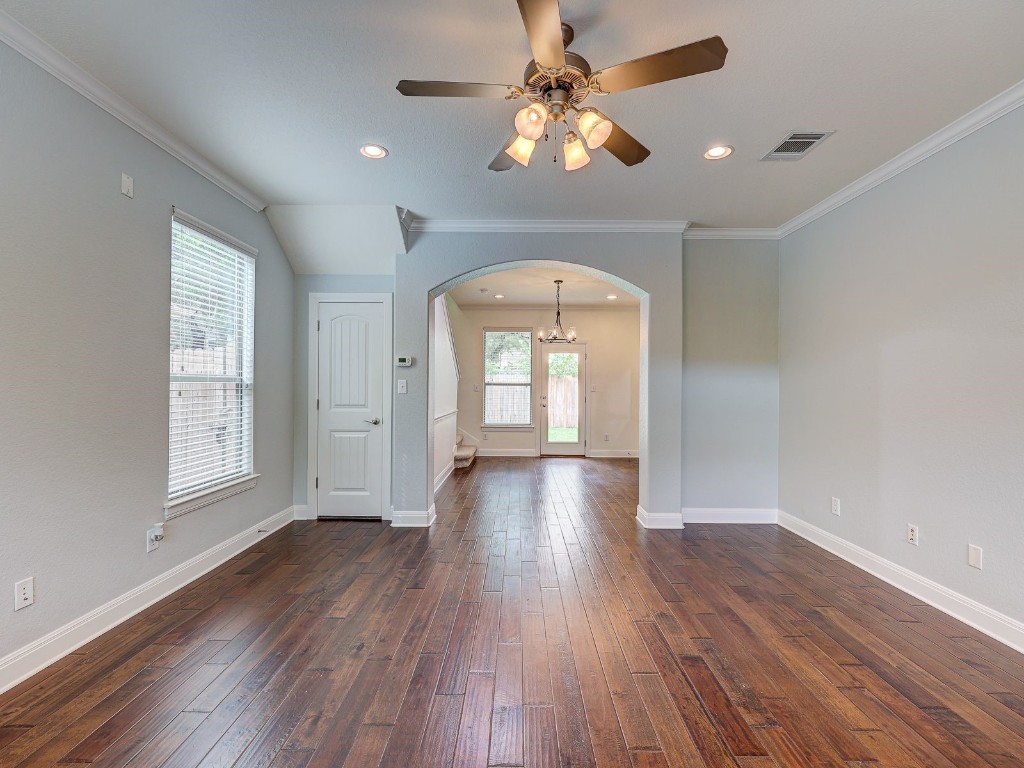 6708 Menchaca Road, Unit 7 Austin, TX 78745 - Photo 8 of 32 wooden floor in an empty room with a window