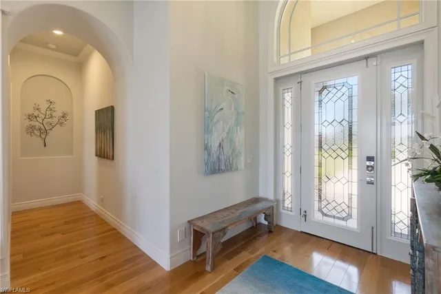 a view of livingroom with hardwood floor and hallway
