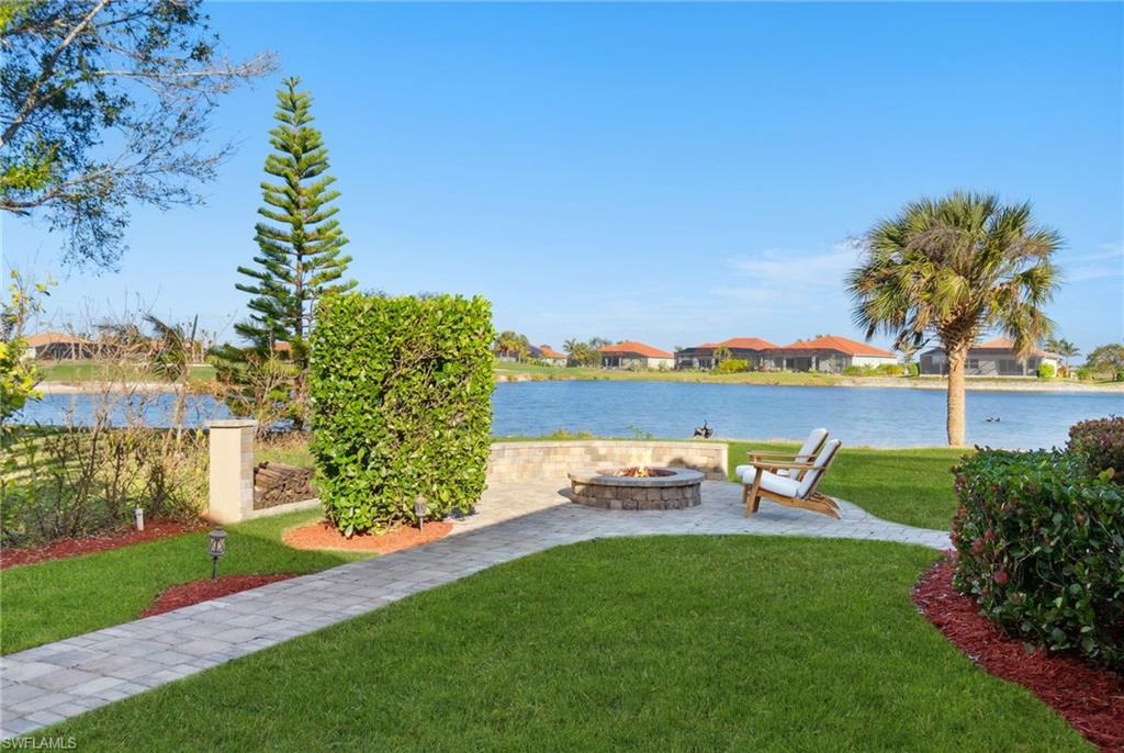 18018 Broadview Drive Naples, FL 34114 - Photo 6 of 46 a view of a garden with houses
