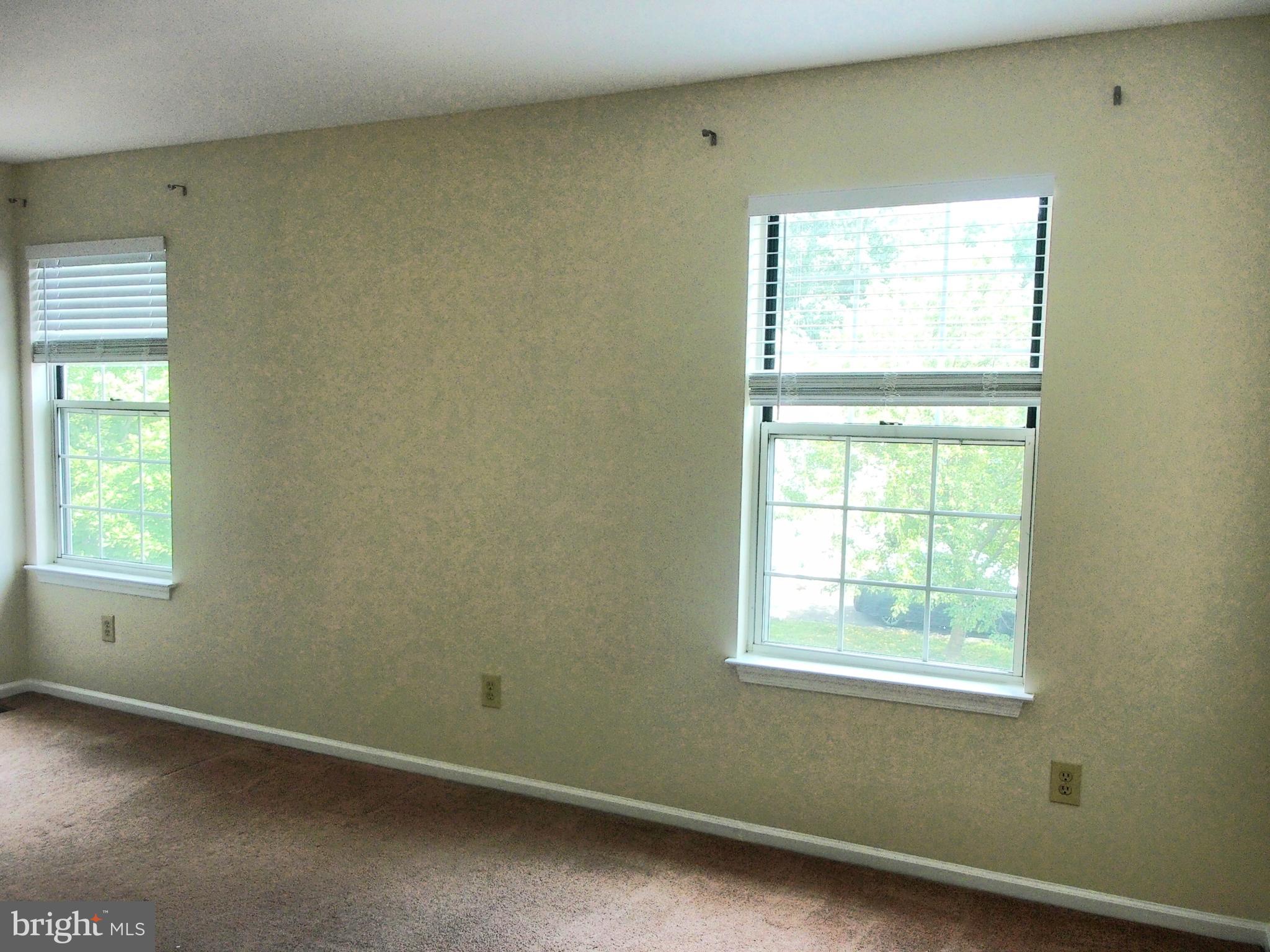 857 Jackson Street Lansdale, PA 19446 - Photo 12 of 22 an empty room with a window