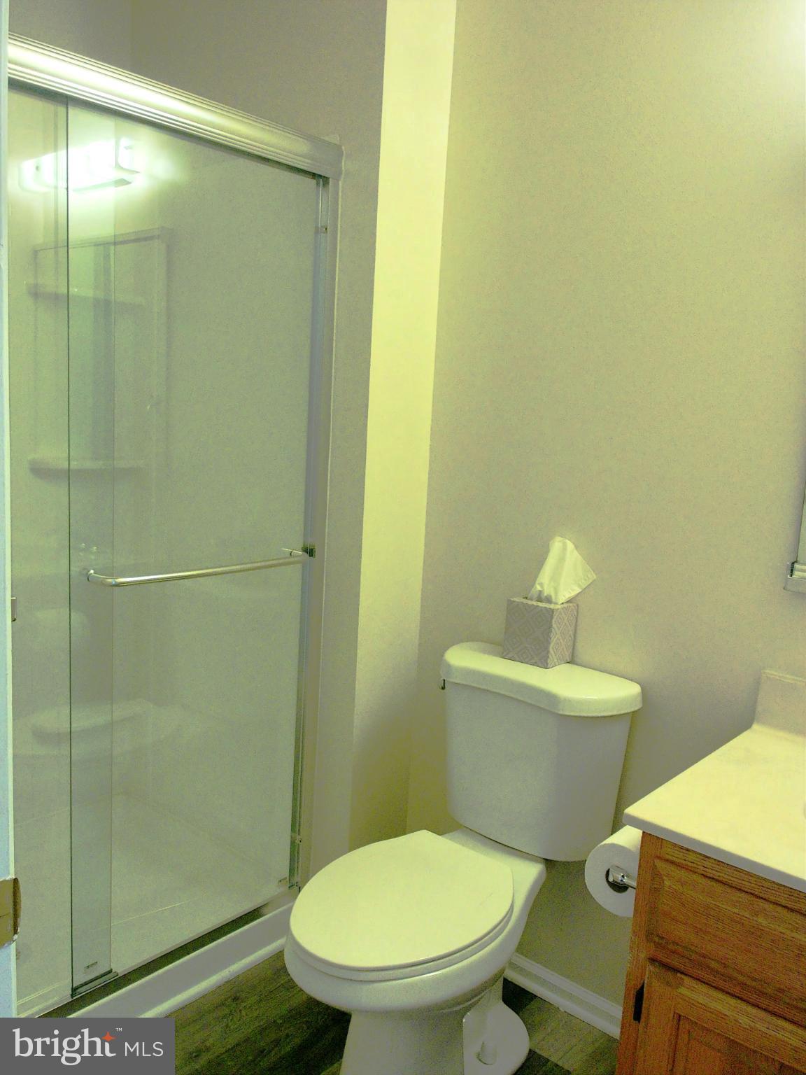 857 Jackson Street Lansdale, PA 19446 - Photo 16 of 22 a white toilet sitting next to a bathroom sink