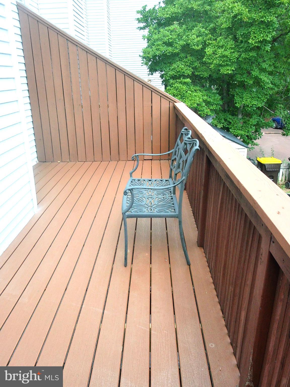 857 Jackson Street Lansdale, PA 19446 - Photo 7 of 22 a balcony view with wooden floor and fence