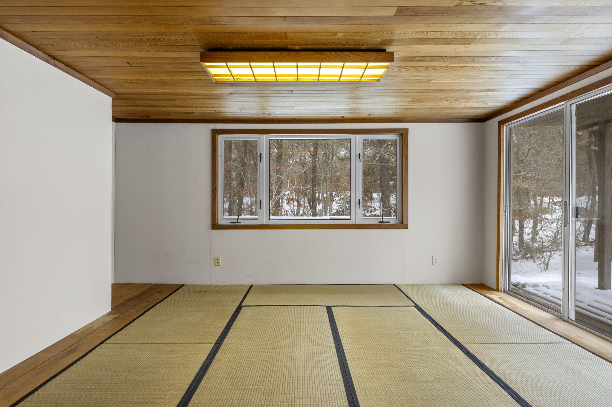 58 Aunt Molls Ridge Brewster, MA 02631 - Photo 15 of 53 a view of an empty room with a window