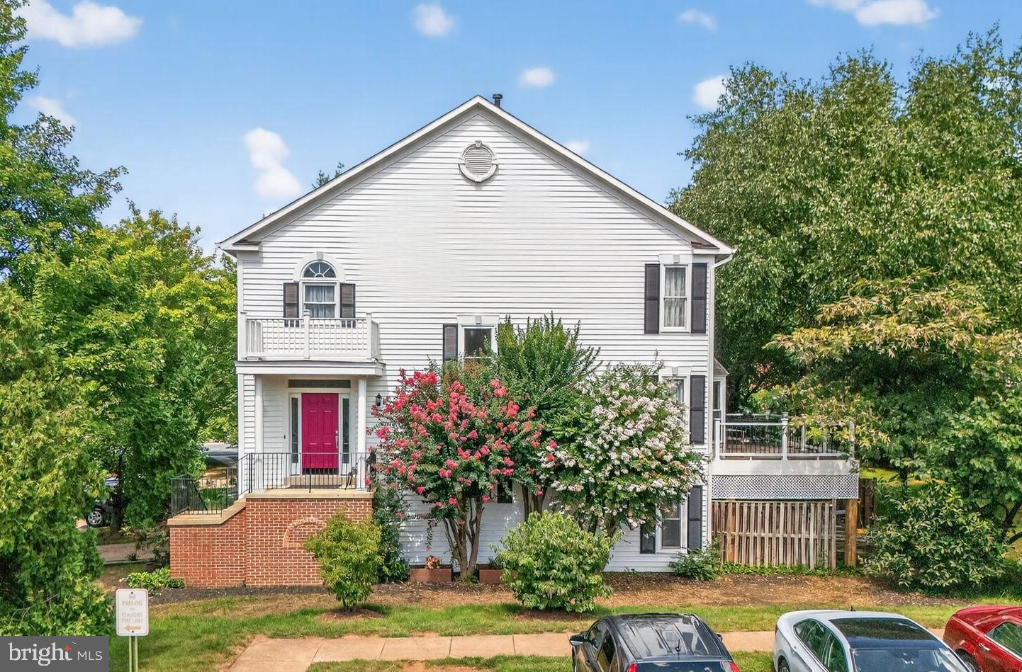a front view of a house with yard
