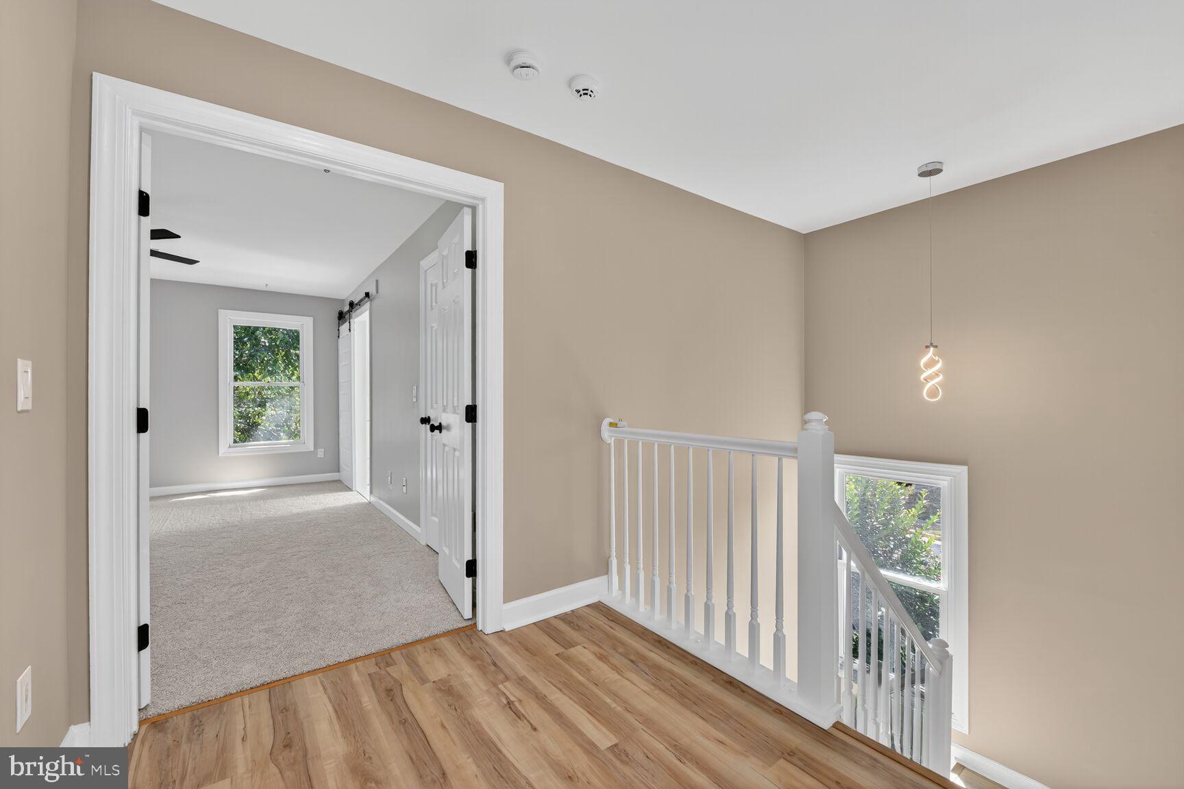 20970 Promontory Square Sterling, VA 20165 - Photo 15 of 44 a view of livingroom with furniture and wooden floor