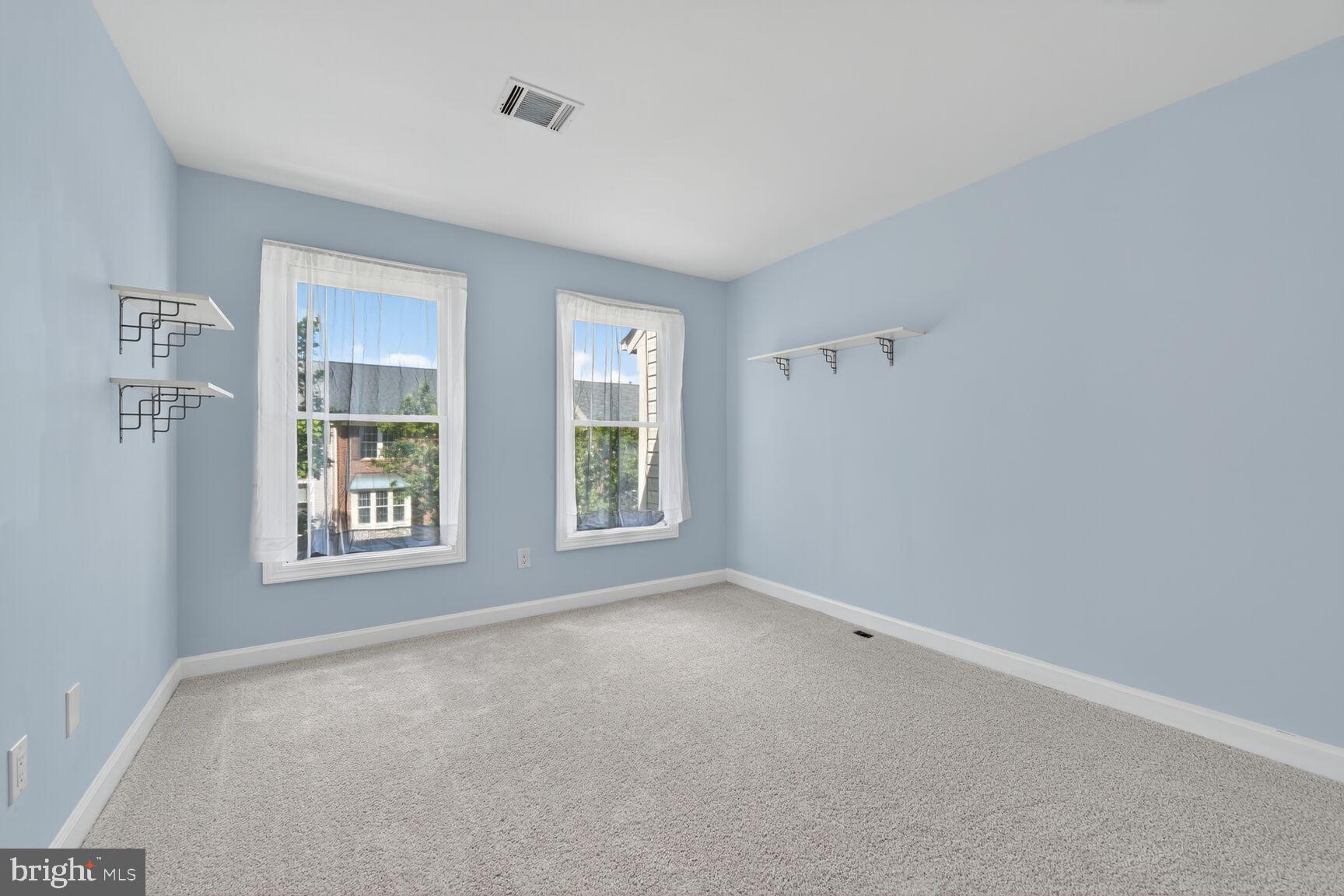 20970 Promontory Square Sterling, VA 20165 - Photo 26 of 44 an empty room with windows