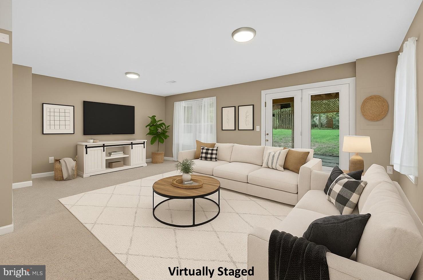 20970 Promontory Square Sterling, VA 20165 - Photo 27 of 44 a living room with furniture and a flat screen tv