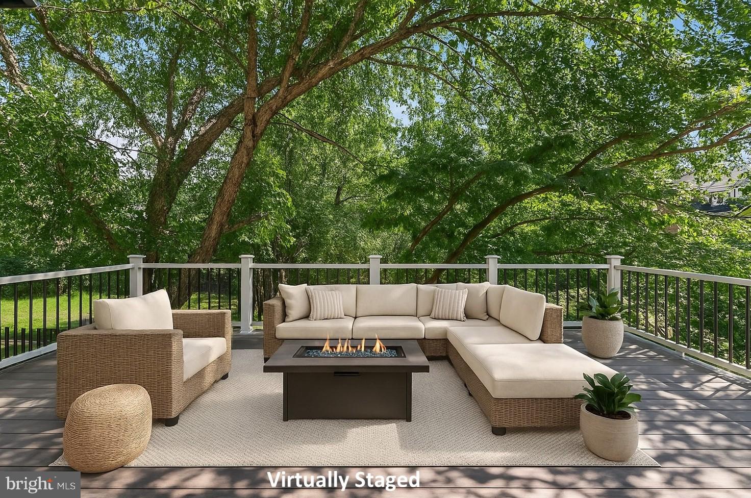 20970 Promontory Square Sterling, VA 20165 - Photo 32 of 44 a roof deck with couches and wooden fence