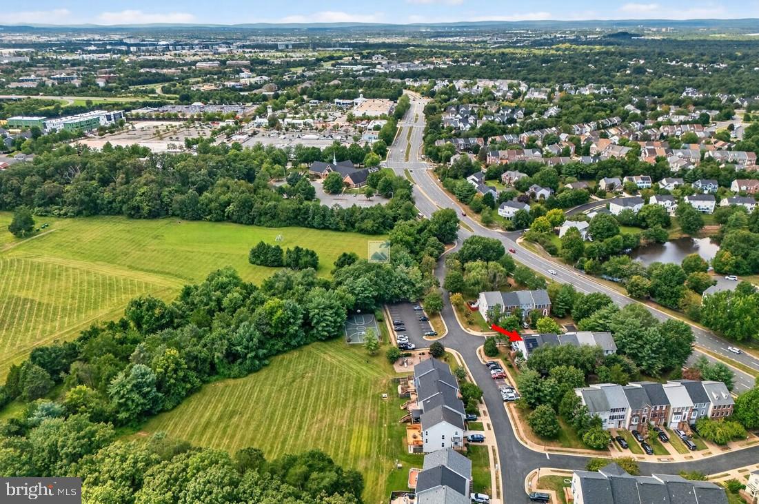 20970 Promontory Square Sterling, VA 20165 - Photo 40 of 44 an aerial view of residential houses with outdoor space and trees