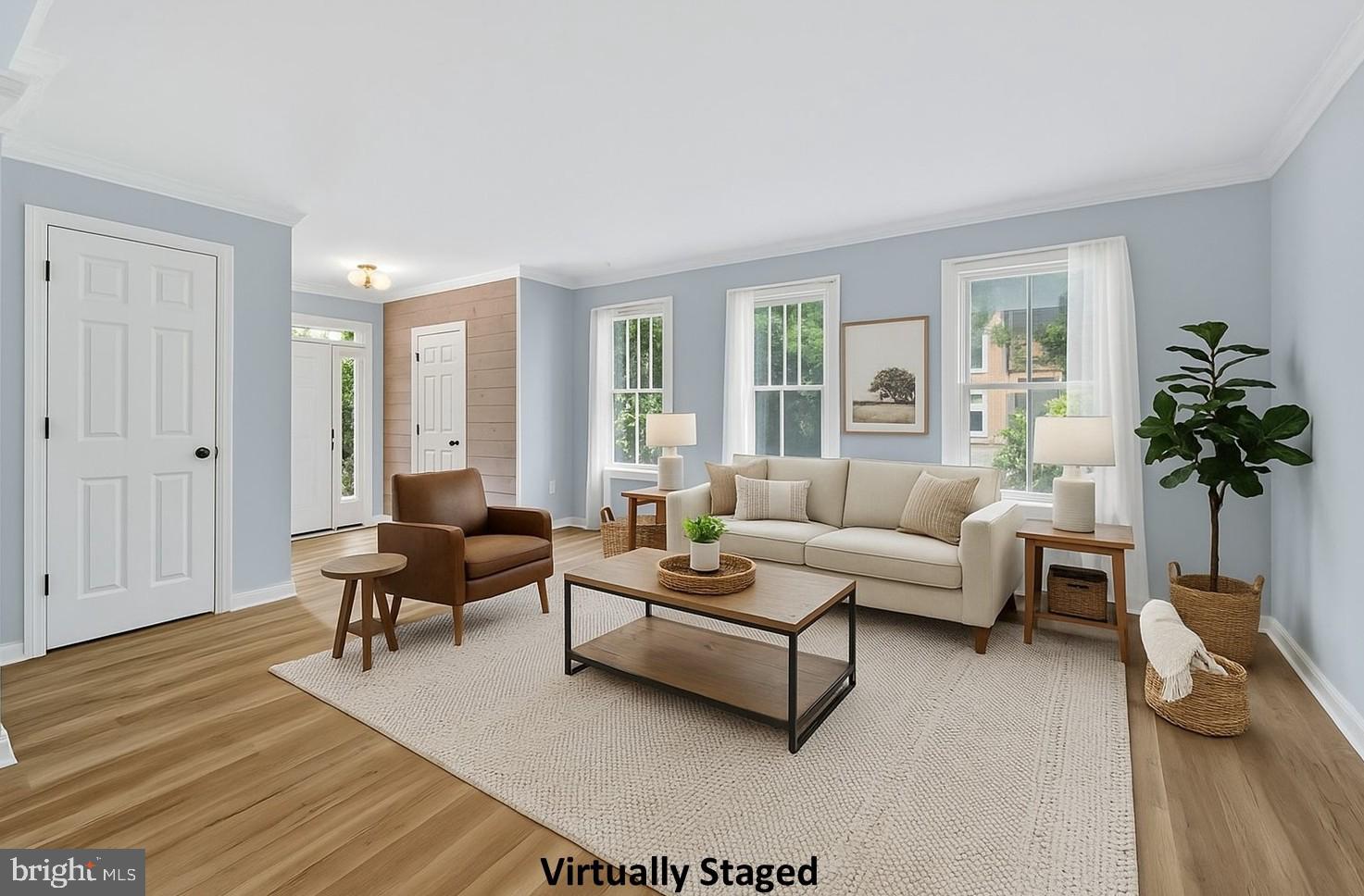 20970 Promontory Square Sterling, VA 20165 - Photo 8 of 44 a living room with furniture and a potted plant