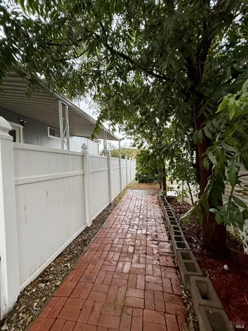 a view of a backyard of the house
