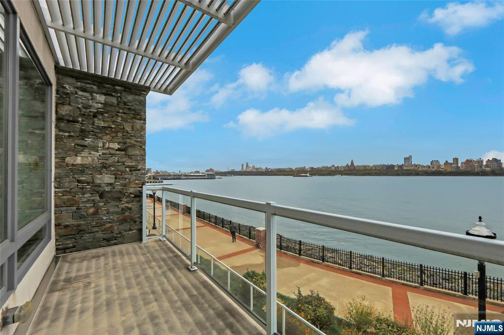 3 Somerset Lane, Unit 109 Edgewater, NJ 07020 - Photo 34 of 50 a view of lake