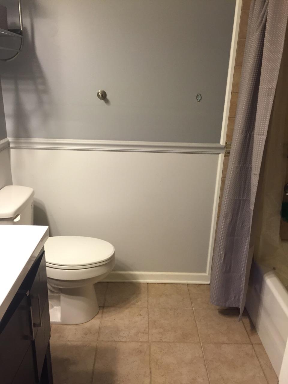 5629 Buckward Road Baker, FL 32531 - Photo 13 of 20 a white toilet sitting next to a shower