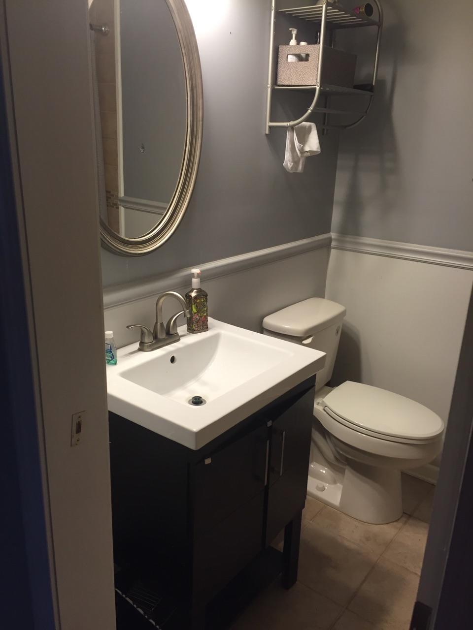 5629 Buckward Road Baker, FL 32531 - Photo 14 of 20 a bathroom with a sink and a mirror