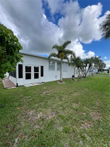 a view of swimming pool from a balcony