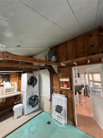 a view of a house with wooden floor and roof