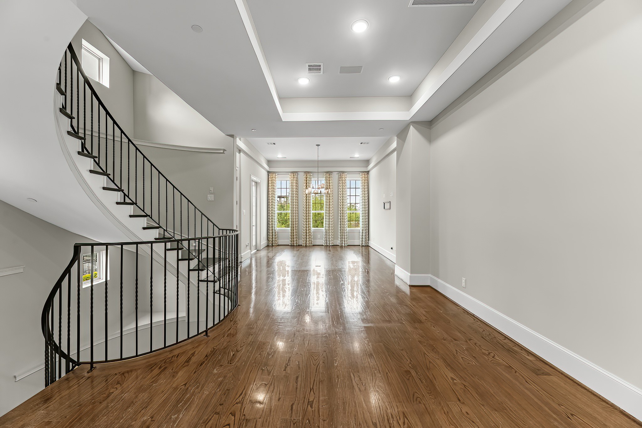 3709 Somerset Commons Lane Houston, TX 77055 - Photo 15 of 32 a view of entryway with wooden floor