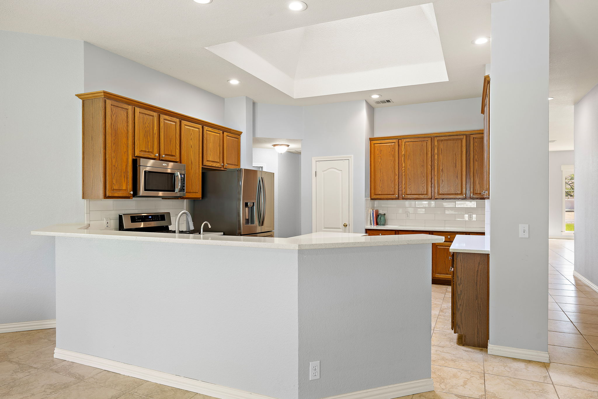 1102 Nelson Ranch Road Cedar Park, TX 78613 - Photo 18 of 37 A well-equipped kitchen boasts ample cabinet storage and modern stainless steel appliances.