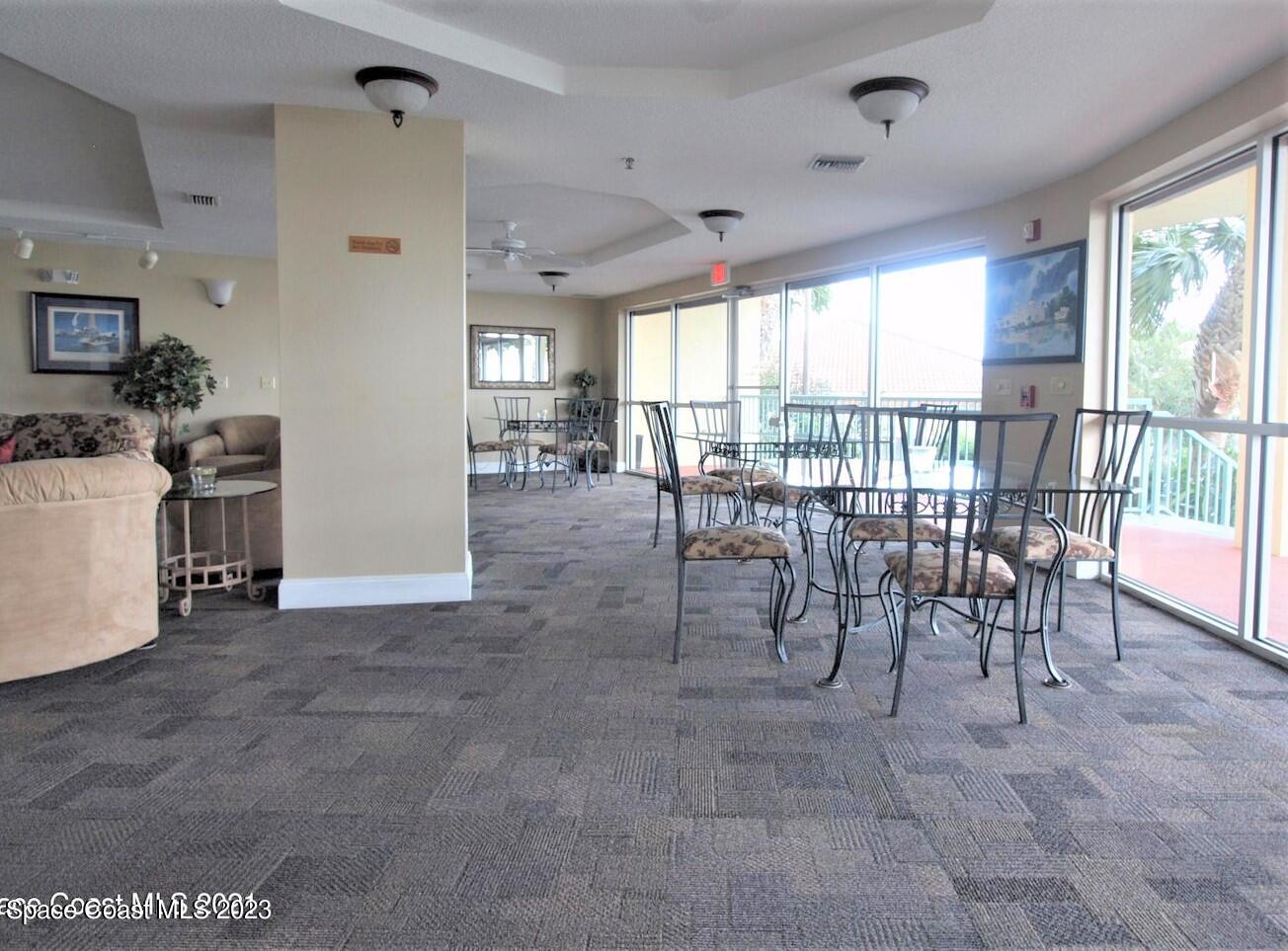 100 Riverside Drive, Unit 403 Cocoa, FL 32922 - Photo 30 of 30 a view of a livingroom with furniture window and outside view
