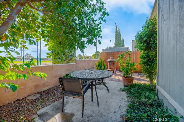 a view of a table and chairs in patio