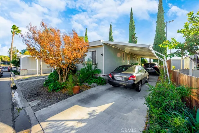 a car parked in front of a house