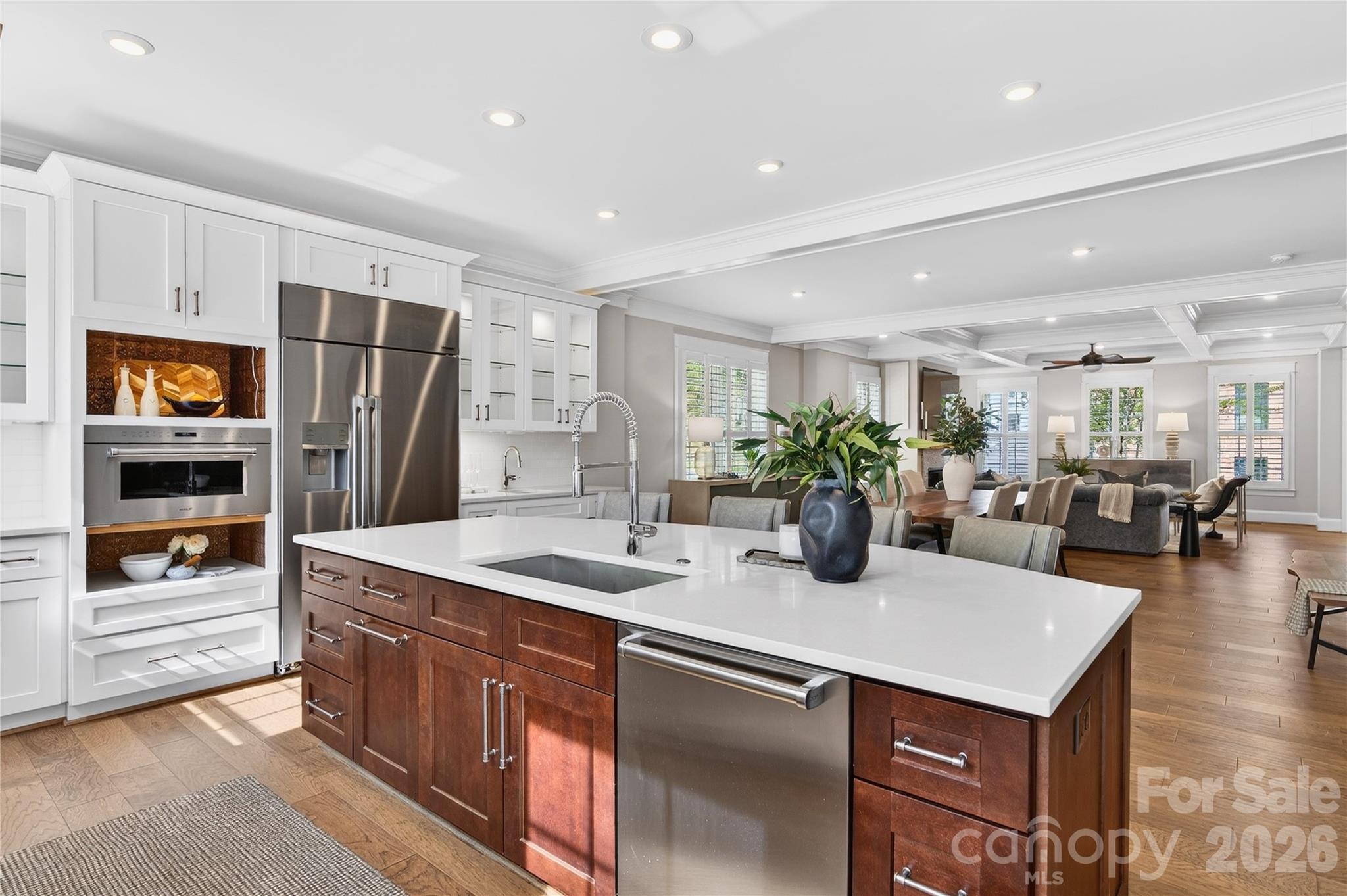 489 South Main Street Davidson, NC 28036 - Photo 11 of 43 a kitchen with stainless steel appliances granite countertop a refrigerator and a sink